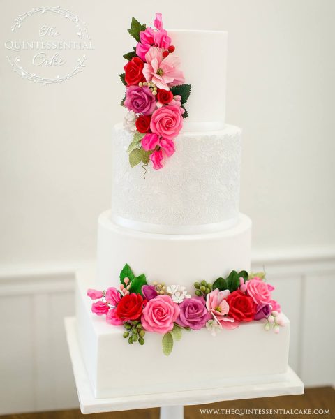 Romantic Wedding Cake featuring Sugar Lace with Pink & Red Sugar Flowers | The Quintessential Cake | Chicago | Luxury Wedding Cakes | Chicago Illuminating Company