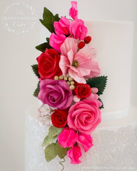 Romantic Wedding Cake featuring Sugar Lace with Pink & Red Sugar Flowers | The Quintessential Cake | Chicago | Luxury Wedding Cakes | Chicago Illuminating Company