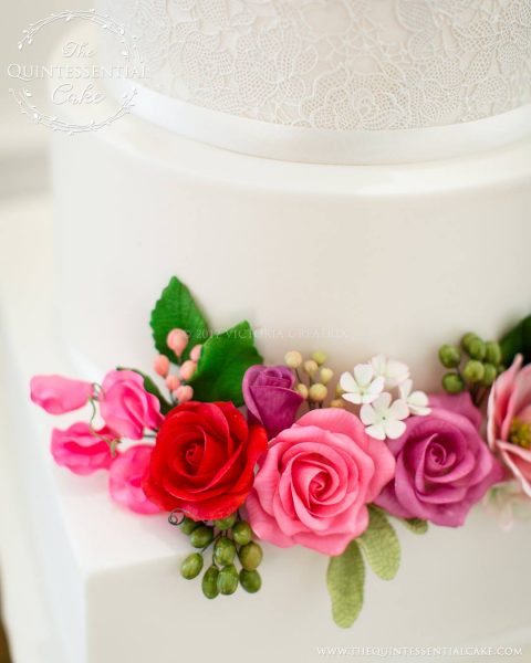 Romantic Wedding Cake featuring Sugar Lace with Pink & Red Sugar Flowers | The Quintessential Cake | Chicago | Luxury Wedding Cakes | Chicago Illuminating Company