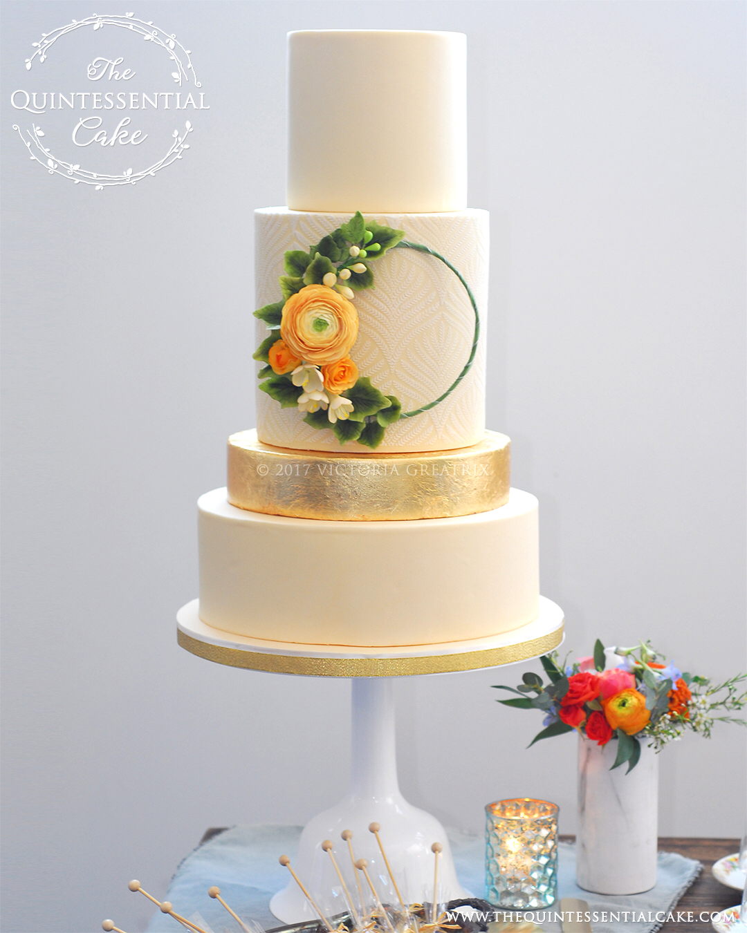 Butter colored Wedding Cake with Gold Leaf and Sugar Flower Hoop | The Quintessential Cake | Chicago | Luxury Wedding Cakes | The Lakewood