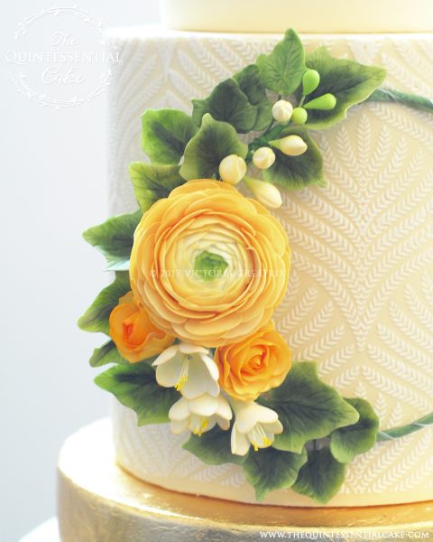 Butter colored Wedding Cake with Gold Leaf and Sugar Flower Hoop | The Quintessential Cake | Chicago | Luxury Wedding Cakes | The Lakewood