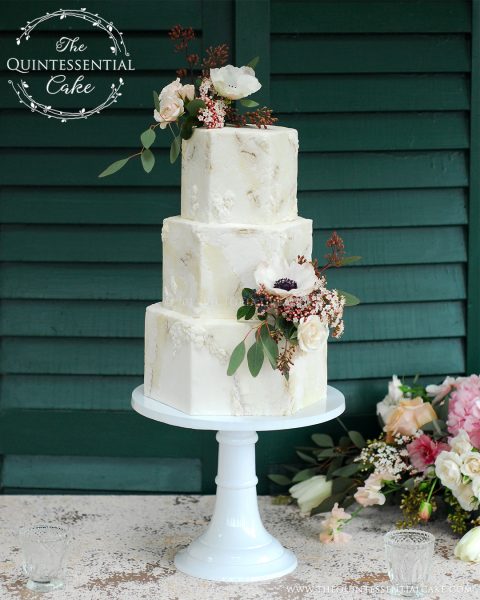 Rough Stone Texture with Bas Relief Detailing and Fresh Flowers | The Quintessential Cake | Chicago | Luxury Wedding Cakes | Danada House