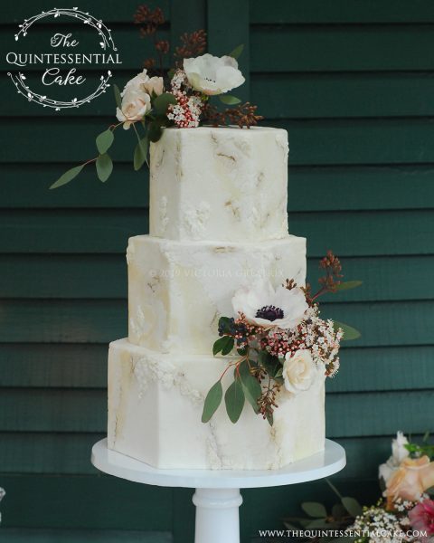 Rough Stone Texture with Bas Relief Detailing and Fresh Flowers | The Quintessential Cake | Chicago | Luxury Wedding Cakes | Danada House