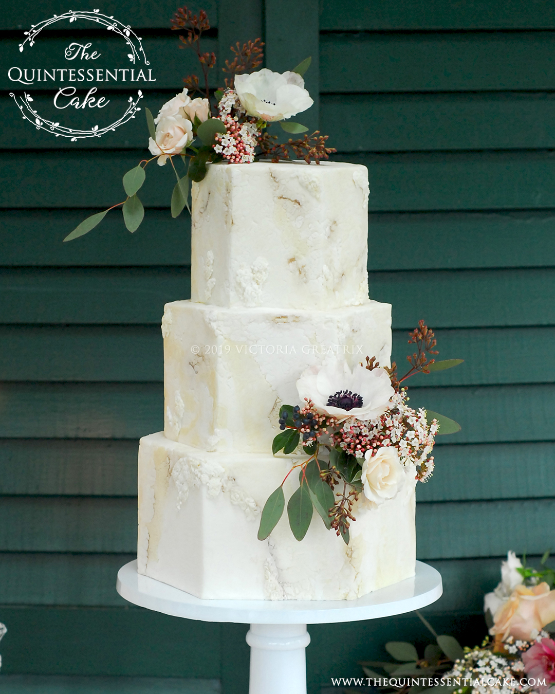 Rough Stone Texture with Bas Relief Detailing and Fresh Flowers | The Quintessential Cake | Chicago | Luxury Wedding Cakes | Danada House
